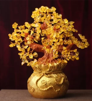 Unlock Wealth and Abundance with a Citrine Money Tree: Your Feng Shui Secret Weapon Are you feeling stuck in a financial rut? Is the energy in your home feeling stagnant? It's time to harness the power of feng shui with a citrine money tree! This dazzling gemstone ornament could be the key to unlocking prosperity and abundance in your life. What is a Citrine Money Tree? A citrine money tree is a powerful feng shui tool designed to enhance wealth energy in your space. Crafted with genuine citrine crystals, this ornamental tree is said to: Clear energy blockages Stimulate the flow of chi (life force energy) Create a welcoming environment for wealth and abundance The Magic of Citrine Citrine, often called the "Merchant's Stone" or "Success Stone," is renowned for its ability to: Manifest desires Attract success and good fortune Boost financial prosperity Its sunny golden hue radiates positive energy, making it a perfect addition to any home or office. Key Features of a Citrine Money Tree Energy Enhancer: Balances life force energy to improve various aspects of your life Genuine Citrine Crystals: Harnesses the stone's natural manifestation properties Versatile Decor: Perfect for shelves, tables, or near the front door Thoughtful Gift: Ideal for housewarming parties, weddings, or business openings Feng Shui Placement for Maximum Impact To maximize the citrine money tree's wealth-attracting potential: Place it in the southeast sector of your home or workspace Ensure it's visible and unobstructed Keep the area clean and clutter-free The Five Elements Balance The citrine money tree's leaves represent the five feng shui elements: Fire Earth Water Wood Metal This harmonious balance creates an optimal environment for chi to flow, promoting overall happiness and well-being. Amplify Your Intentions To supercharge your citrine money tree's effectiveness: Use wealth-attracting affirmations like "I am a powerful money magnet" Visualize your financial goals while focusing on the tree Express gratitude for the abundance already in your life Ready to Transform Your Financial Energy? If you're ready to welcome prosperity and abundance into your life, a citrine money tree could be the feng shui enhancer you've been searching for. By clearing stagnant energy and promoting the flow of chi, this beautiful ornament may just be the catalyst for positive change in your financial landscape. Remember, feng shui is about creating harmony and balance in your environment. The citrine money tree is not just a decorative piece – it's a powerful tool for aligning your space with your intentions for wealth and success. Are you ready to unlock the potential of your prosperity corner? Share your thoughts and experiences with feng shui in the comments below!